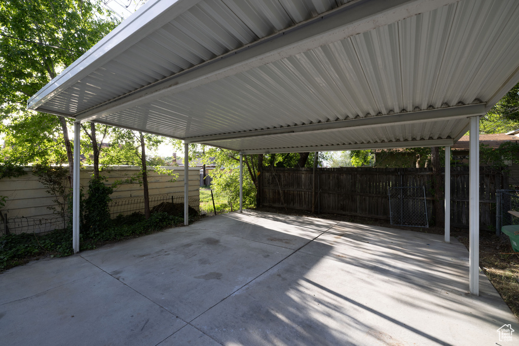 View of patio featuring a detached carport