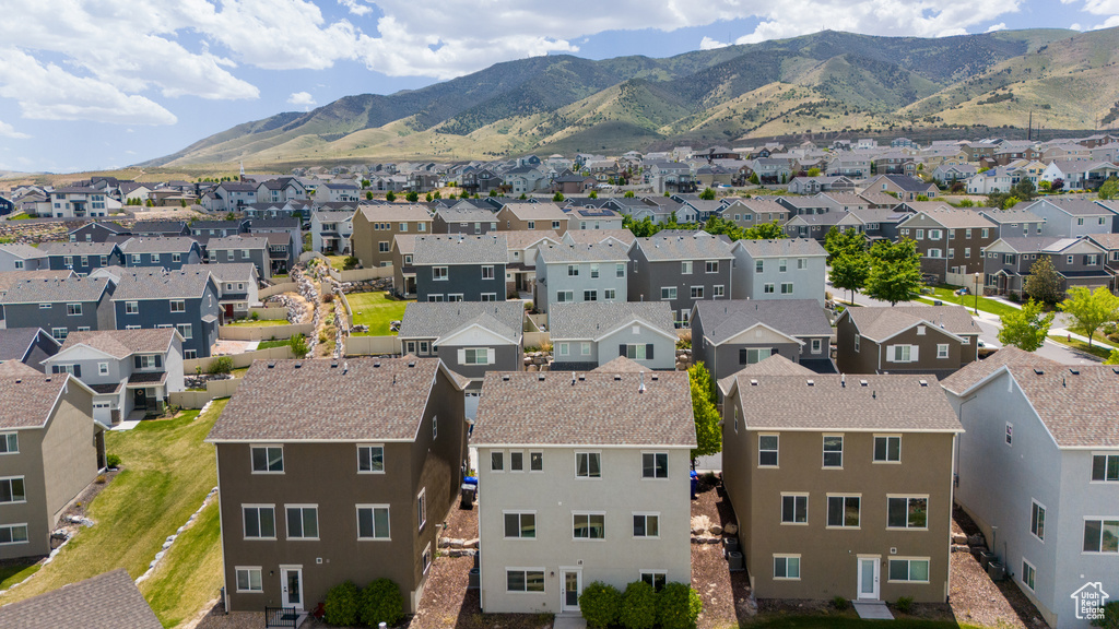 Aerial view of residential area featuring mountains