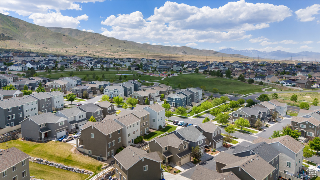 Aerial view of residential area with a mountain backdrop