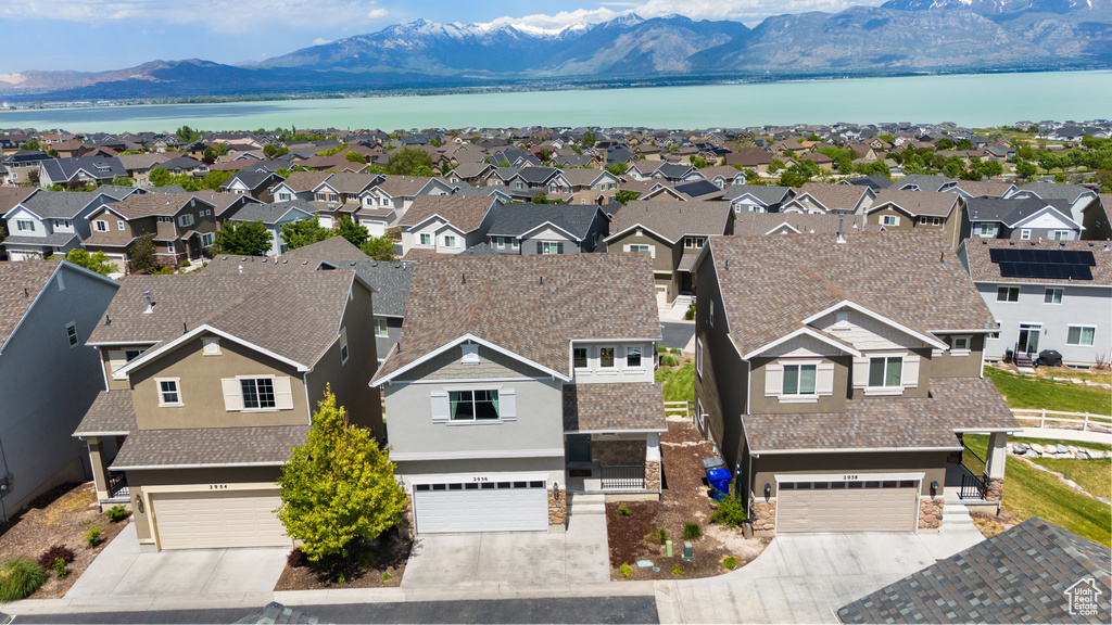 Aerial view of residential area with a water and mountain view