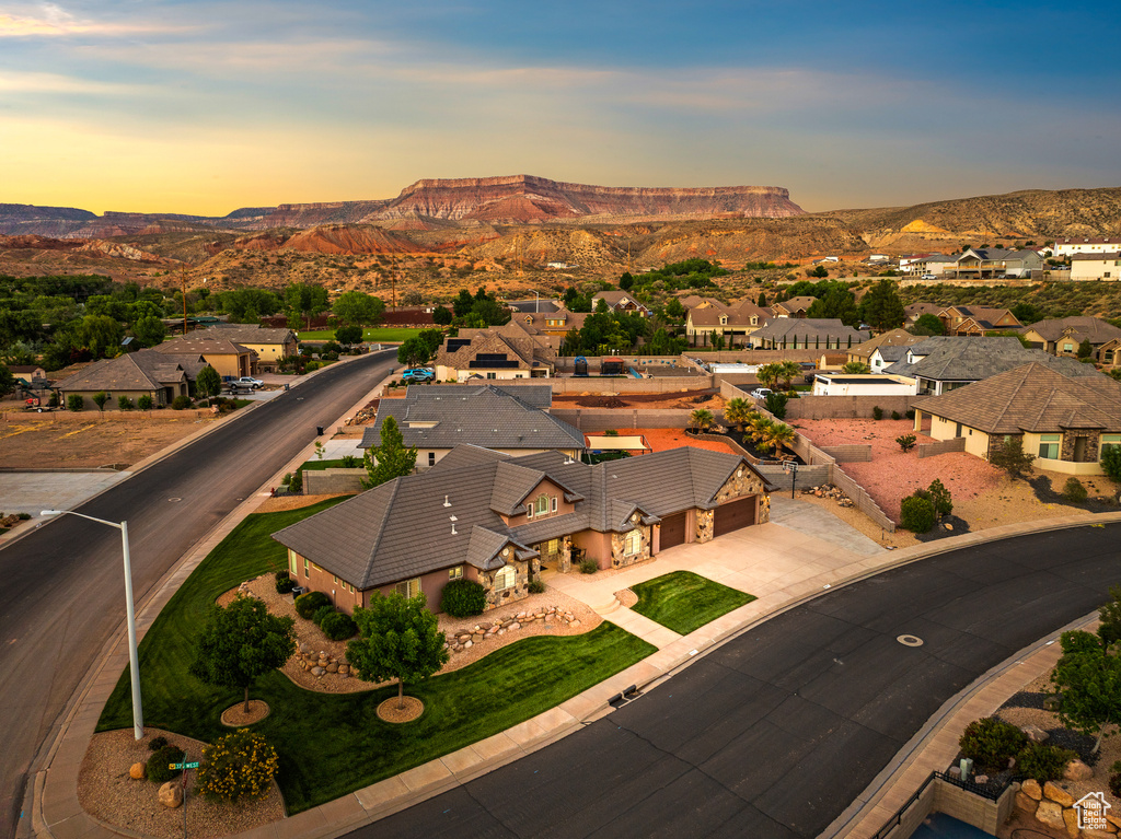 Aerial view at dusk of a mountain view and a residential view