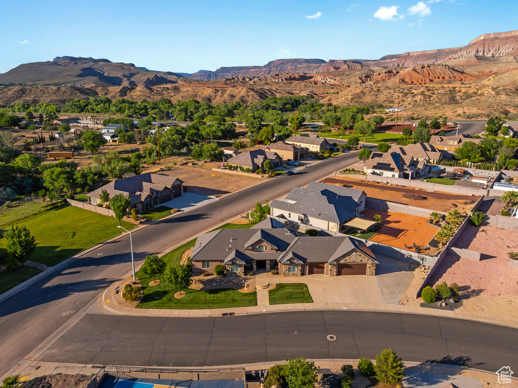 View of property location with nearby suburban area and a mountainous background