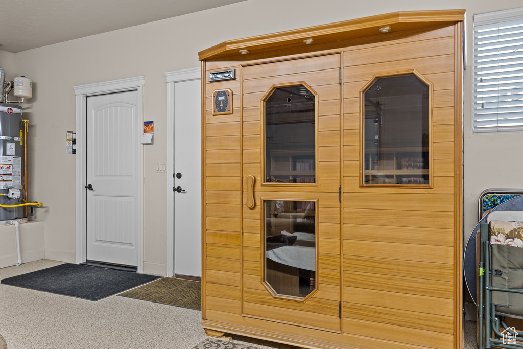 Interior space with baseboards and carpet floors