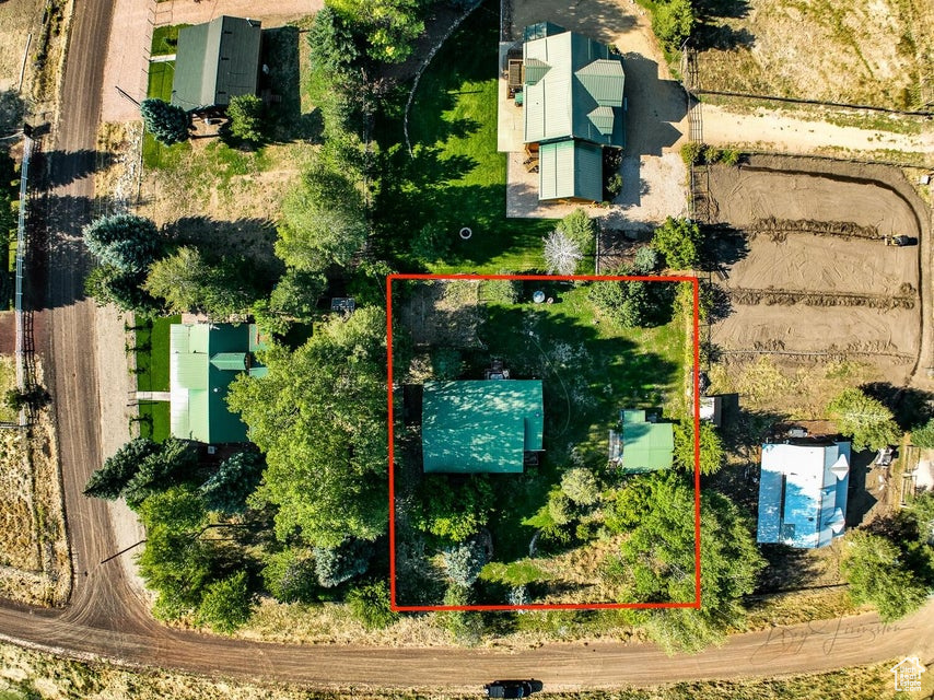 Aerial view of property\'s location with property parcel outlined