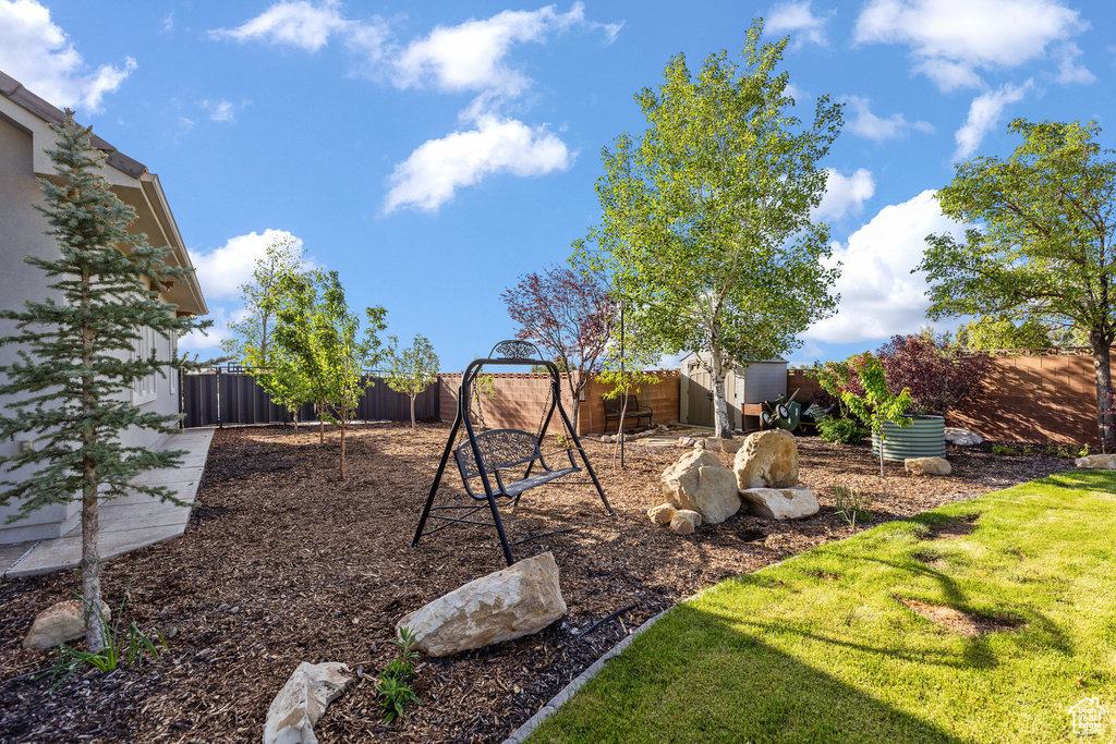 View of fenced backyard