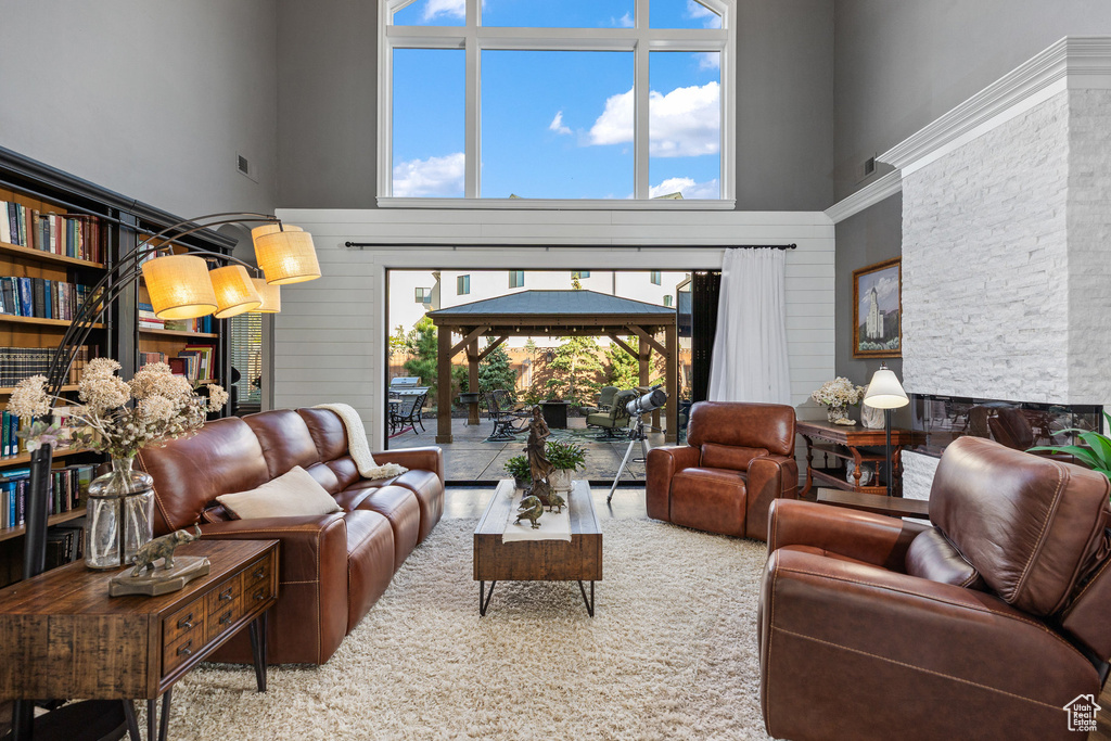 Living room featuring a high ceiling