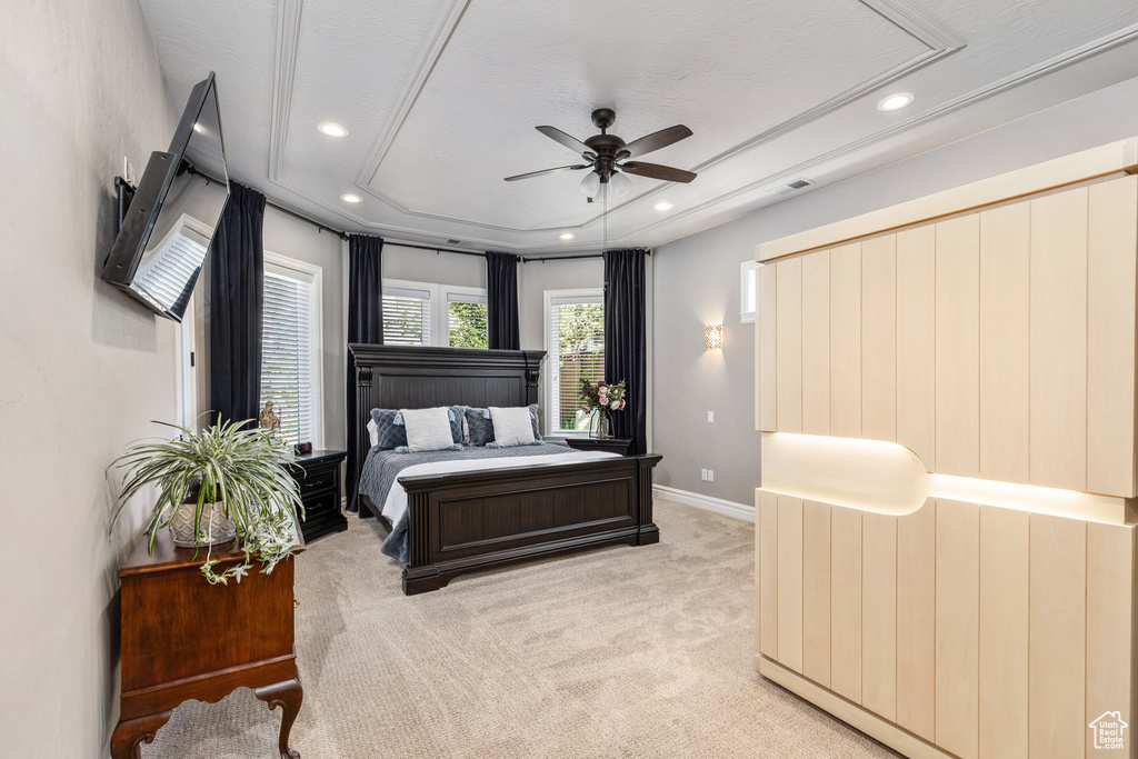 Bedroom featuring light carpet, recessed lighting, baseboards, and a ceiling fan