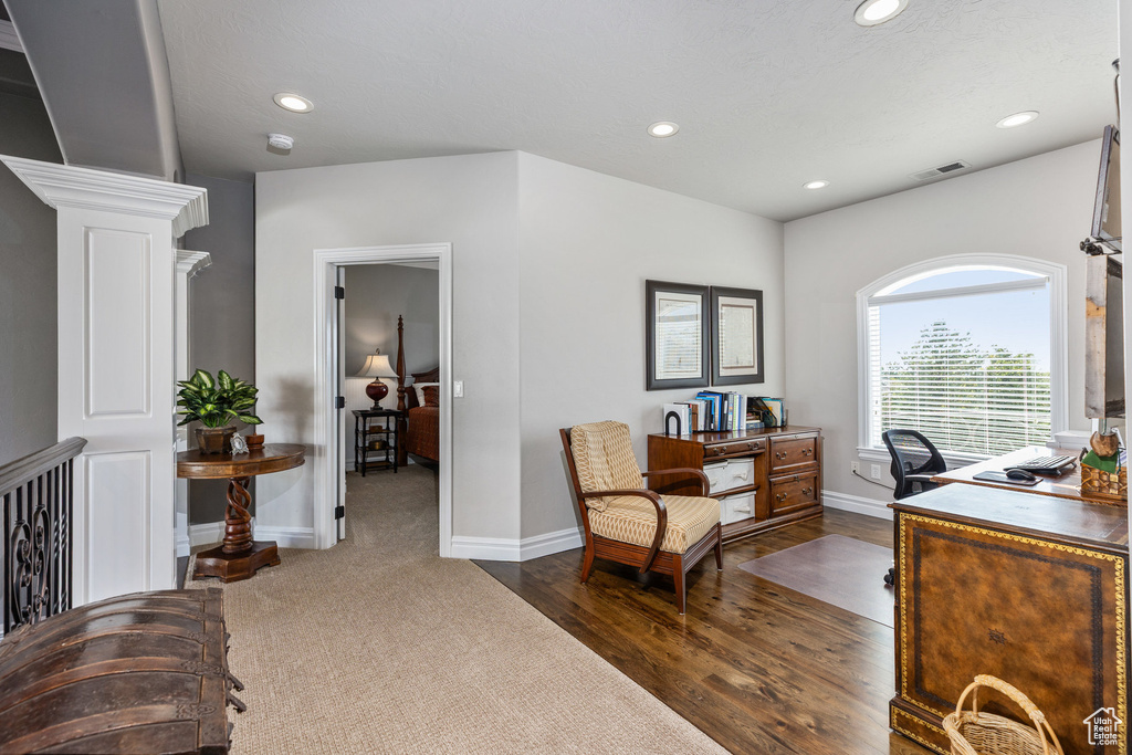 Office area with recessed lighting, baseboards, and dark wood-style floors