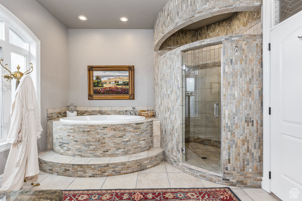 Full bath featuring a bath, tile patterned floors, a stall shower, and recessed lighting