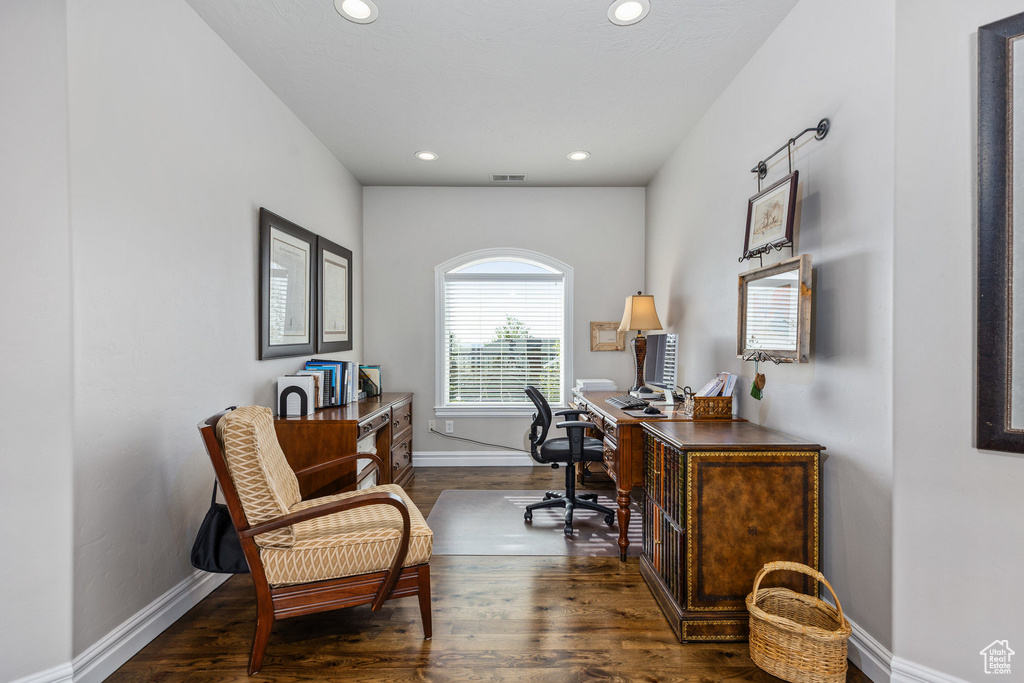 Office space featuring recessed lighting, baseboards, and dark wood-style flooring