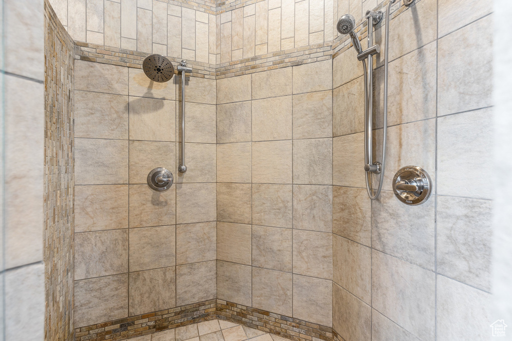Bathroom with tiled shower
