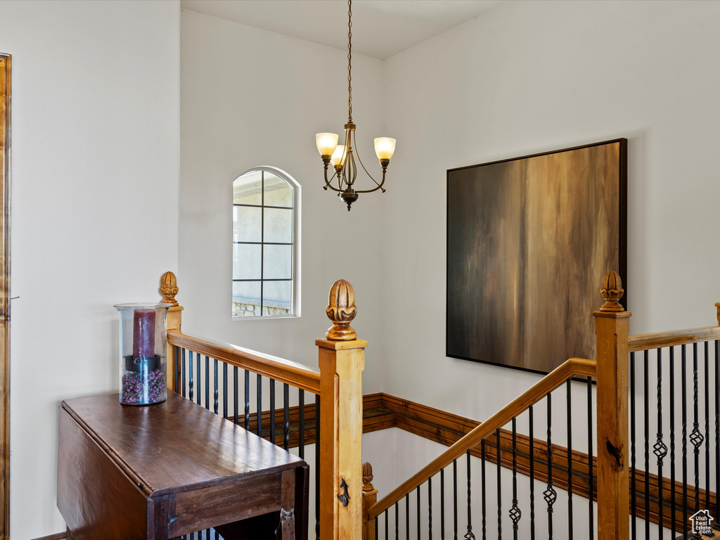 Staircase with a chandelier