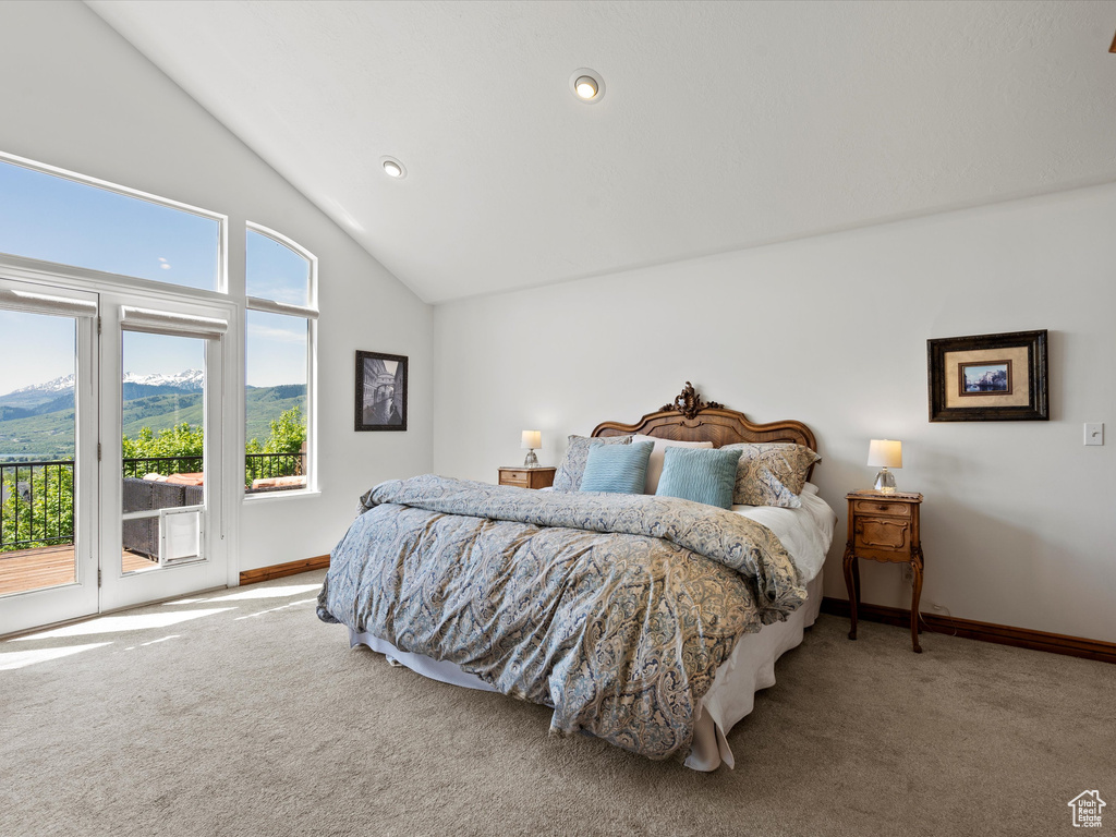 Bedroom featuring carpet floors, access to exterior, baseboards, a mountain view, and recessed lighting