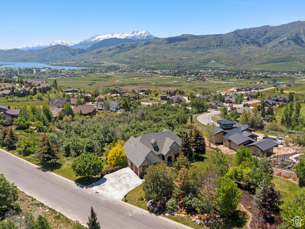Aerial view of residential area with a water and mountain view