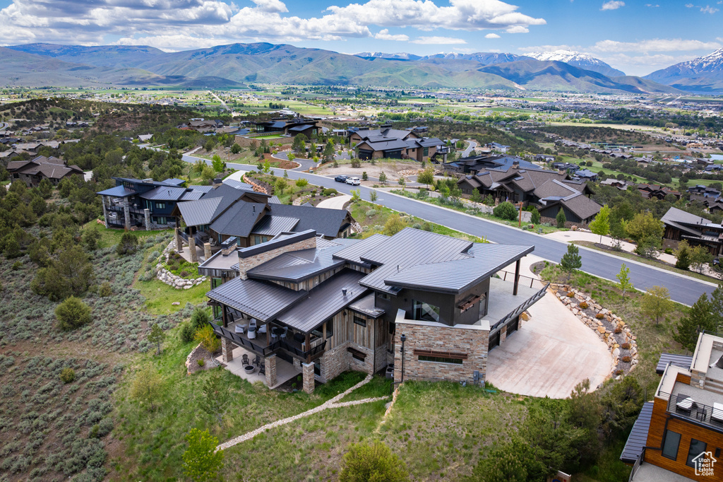 Aerial view of residential area with a mountain backdrop