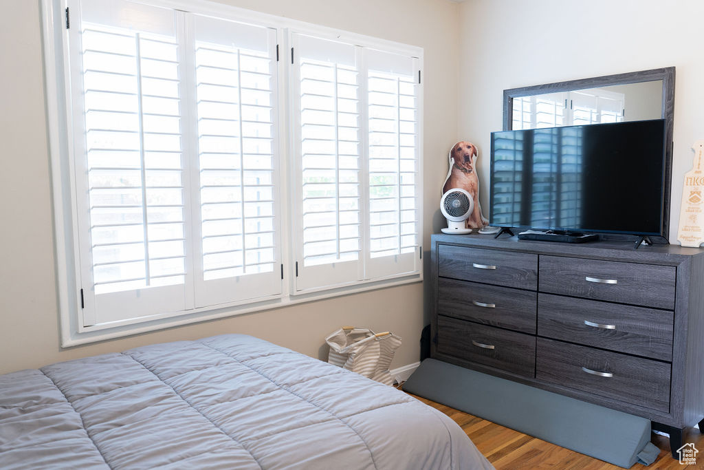 Bedroom featuring wood finished floors
