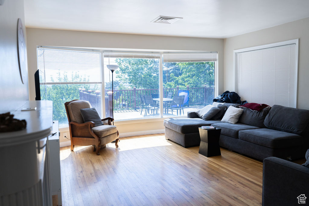 Living area with wood finished floors