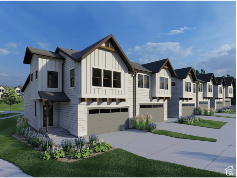 View of property with a garage, board and batten siding, concrete driveway, a residential view, and a front lawn