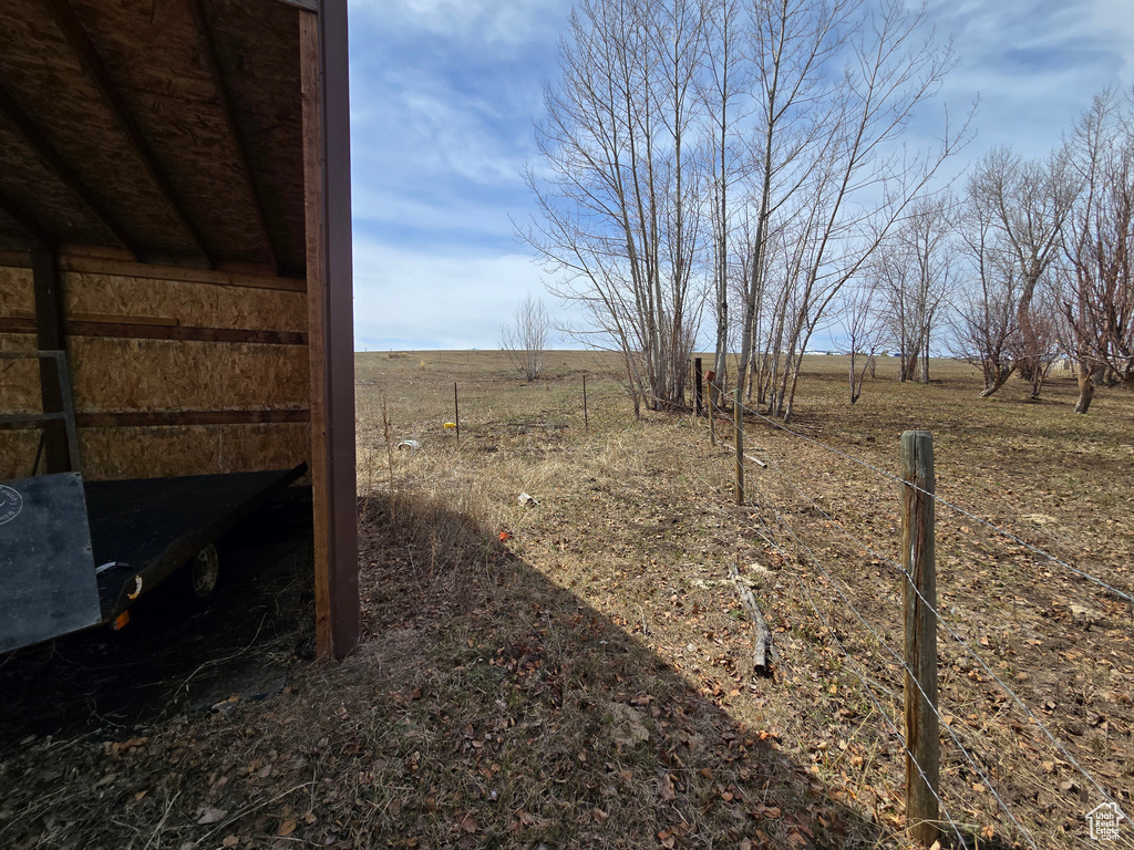 View of yard with a view of rural / pastoral area
