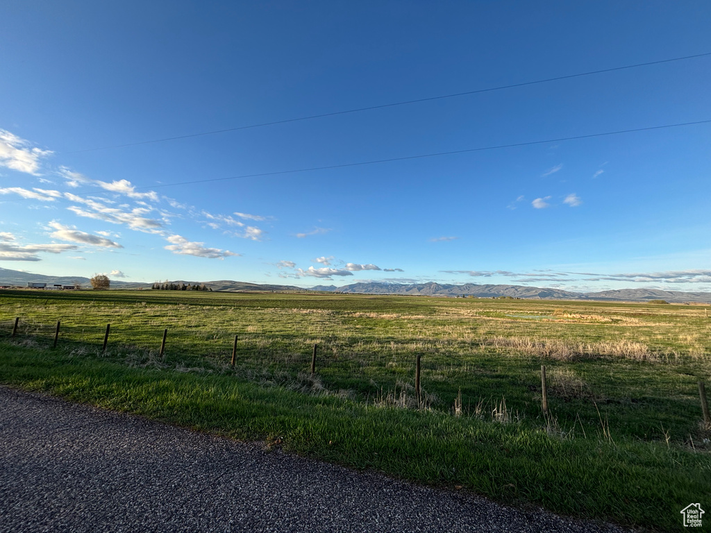 View of road with a view of rural / pastoral area and a mountain view