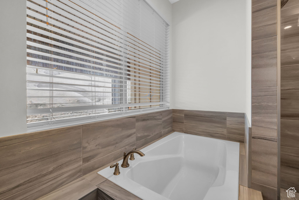 Full bath featuring a garden tub