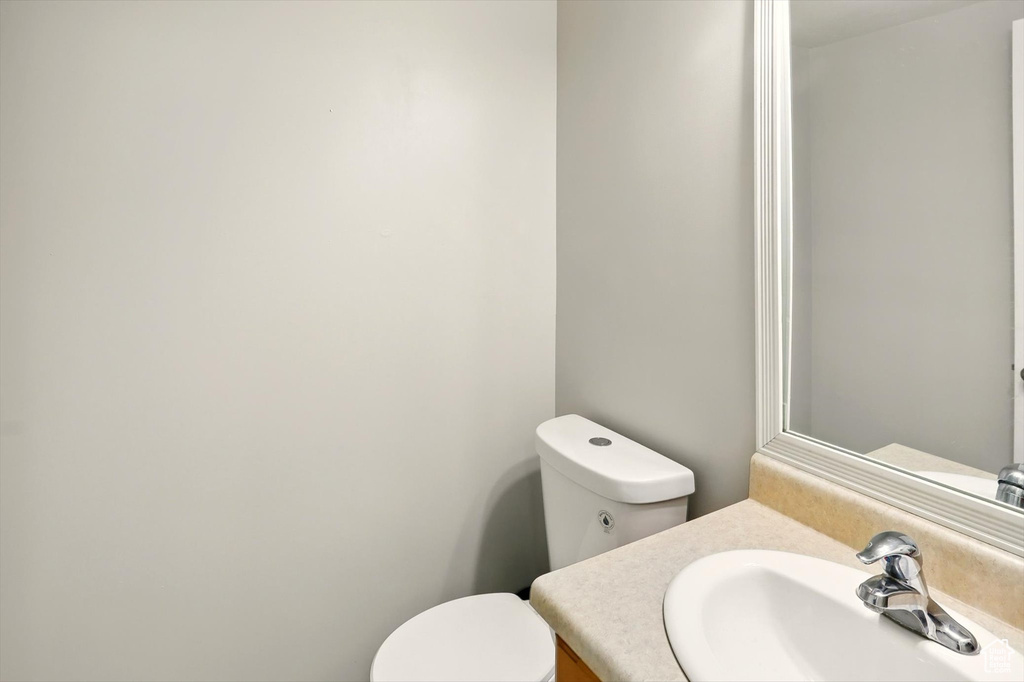 Bathroom with toilet and vanity