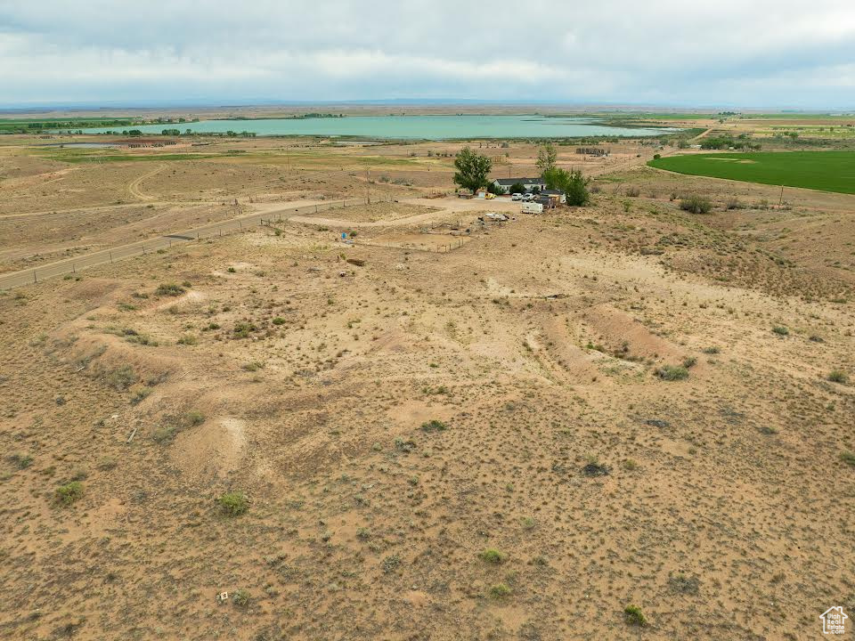 Aerial view of sparsely populated area featuring a large body of water