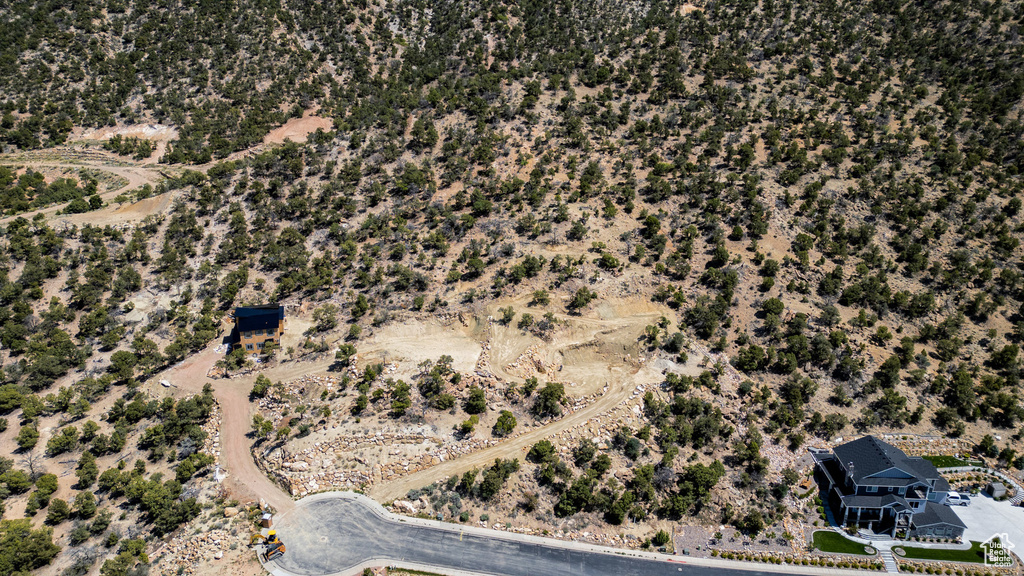 Aerial view of property and surrounding area with a desert landscape and rural landscape