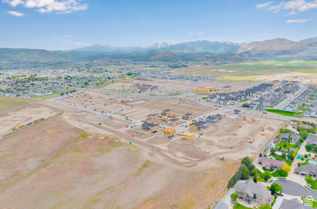 Aerial view of property's location featuring mountains