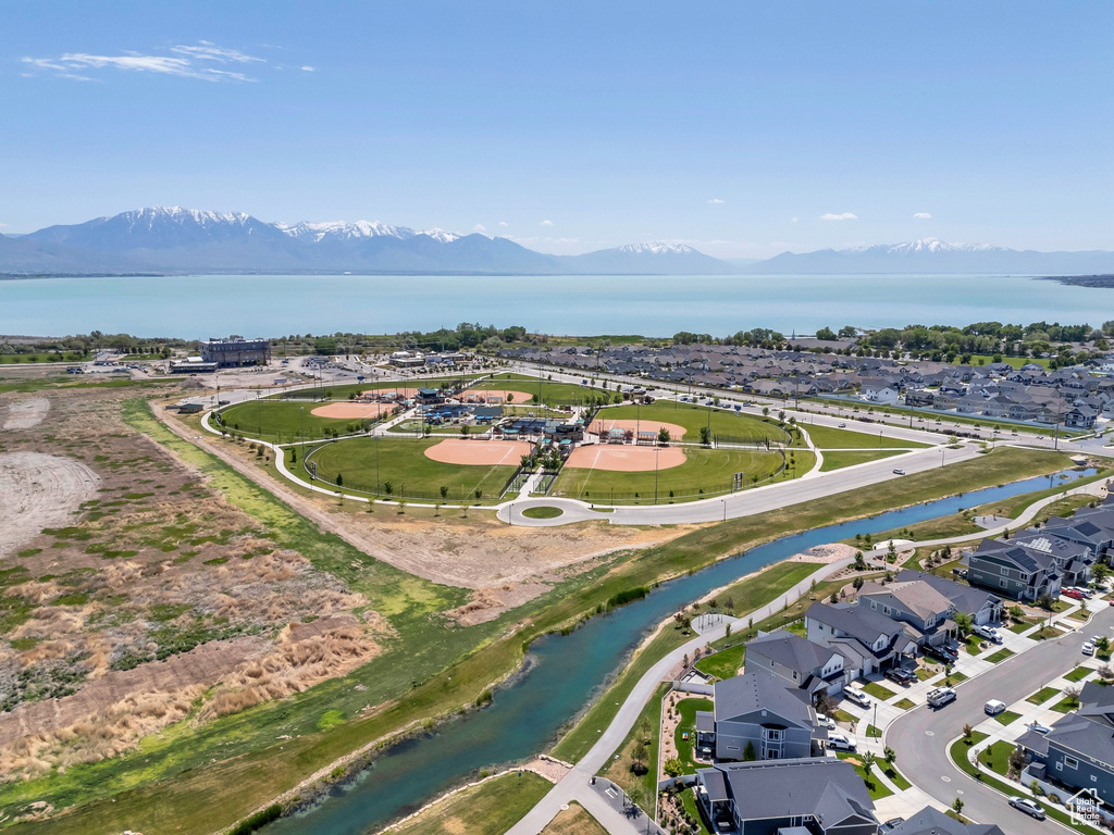 Aerial view of residential area featuring a water and mountain view