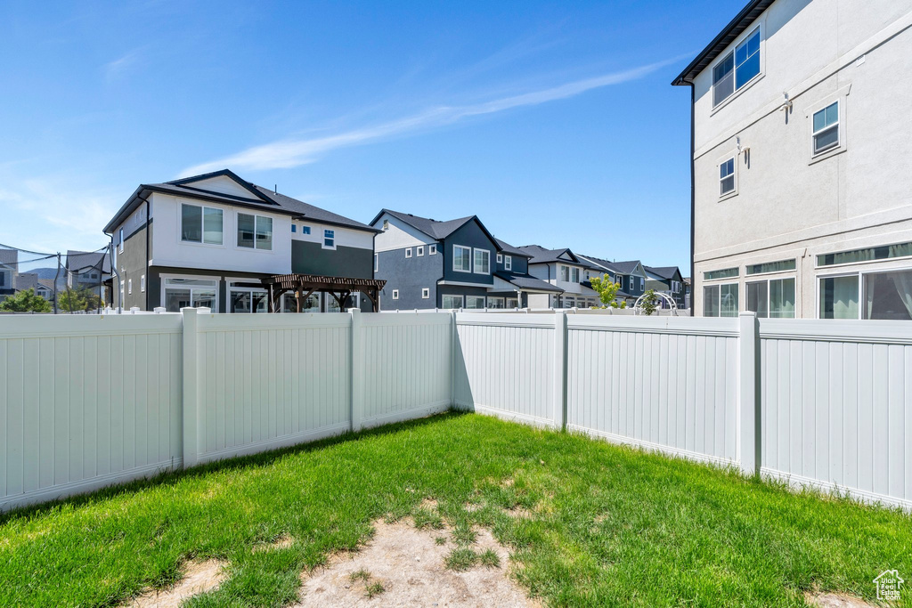 View of yard featuring a residential view