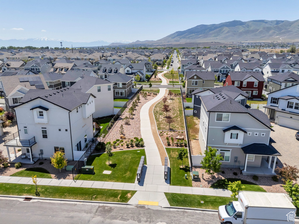 Aerial view of residential area featuring mountains