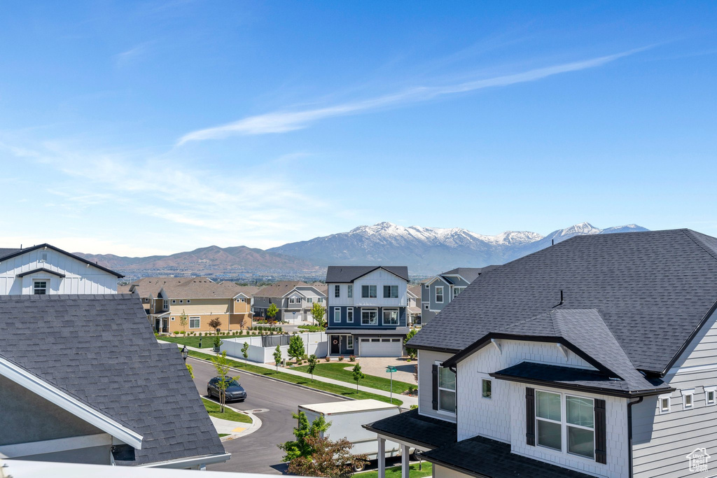View of mountain background featuring nearby suburban area