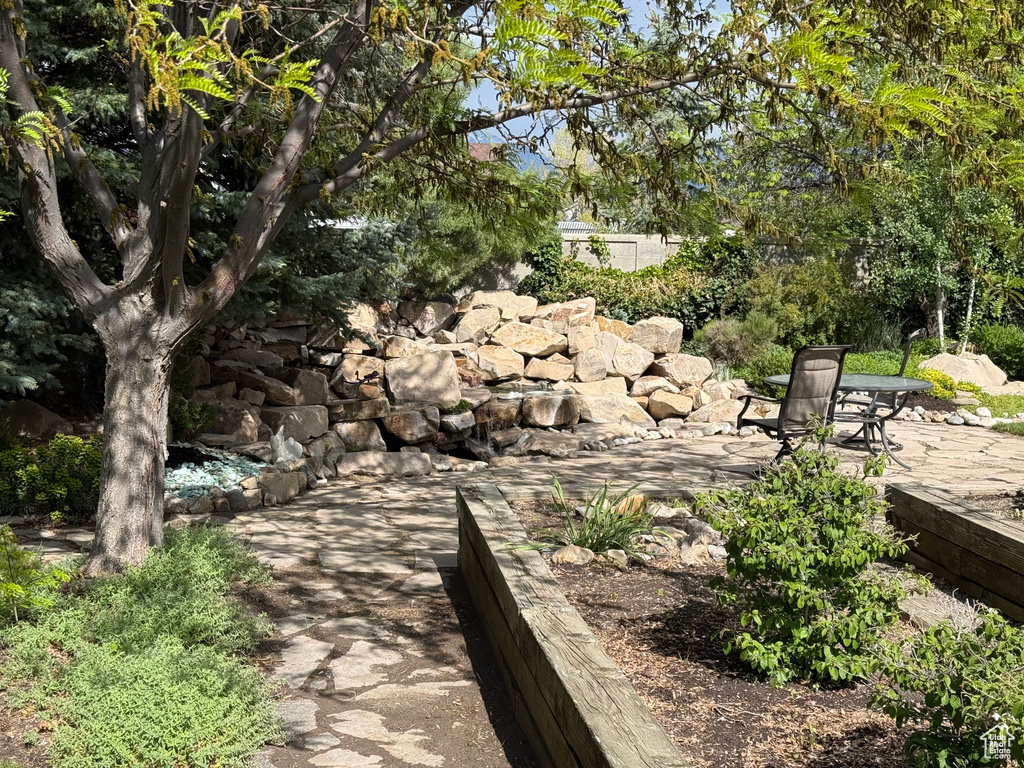 View of property's community featuring a patio area