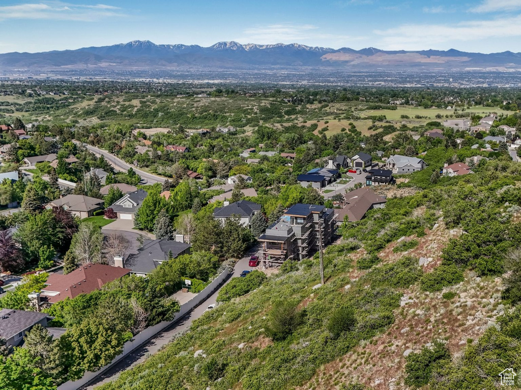 Aerial perspective of suburban area with mountains