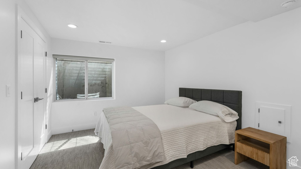 Bedroom with recessed lighting