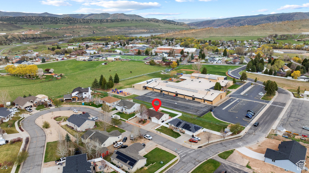 Aerial view featuring a mountain view and a residential view