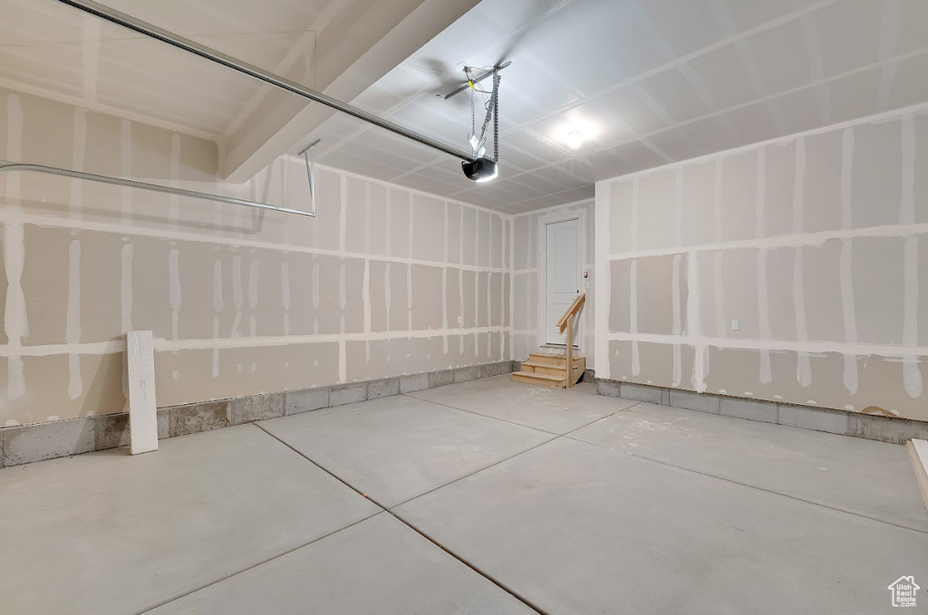 Garage featuring a garage door opener