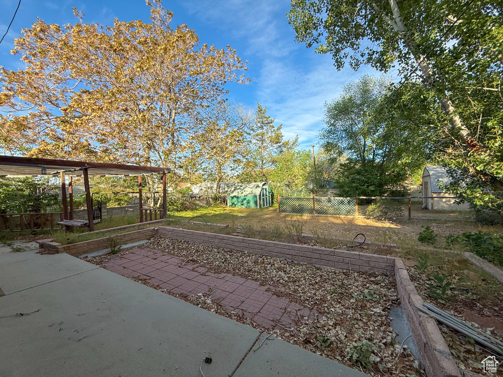 View of yard with a patio