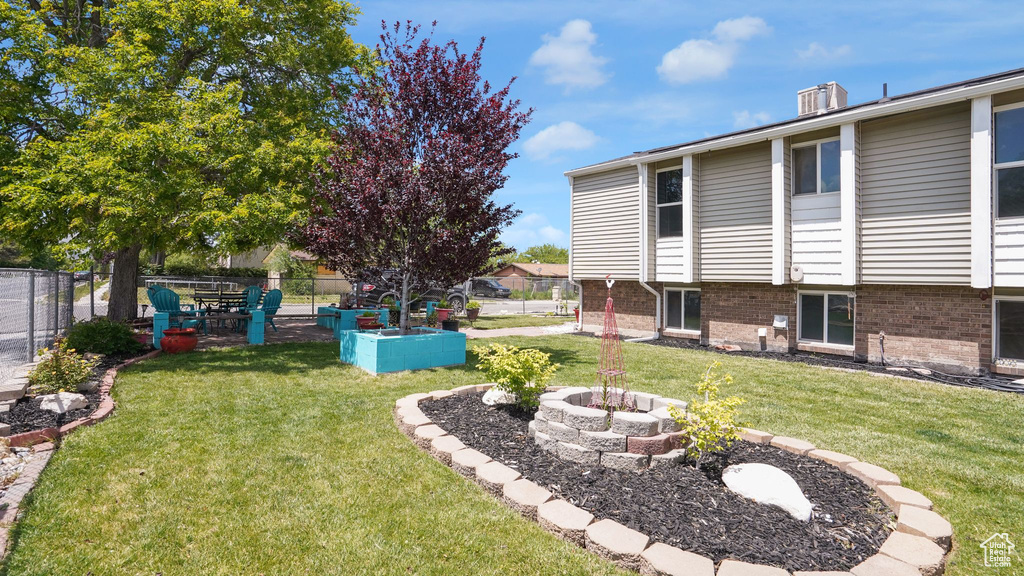 View of yard with a vegetable garden