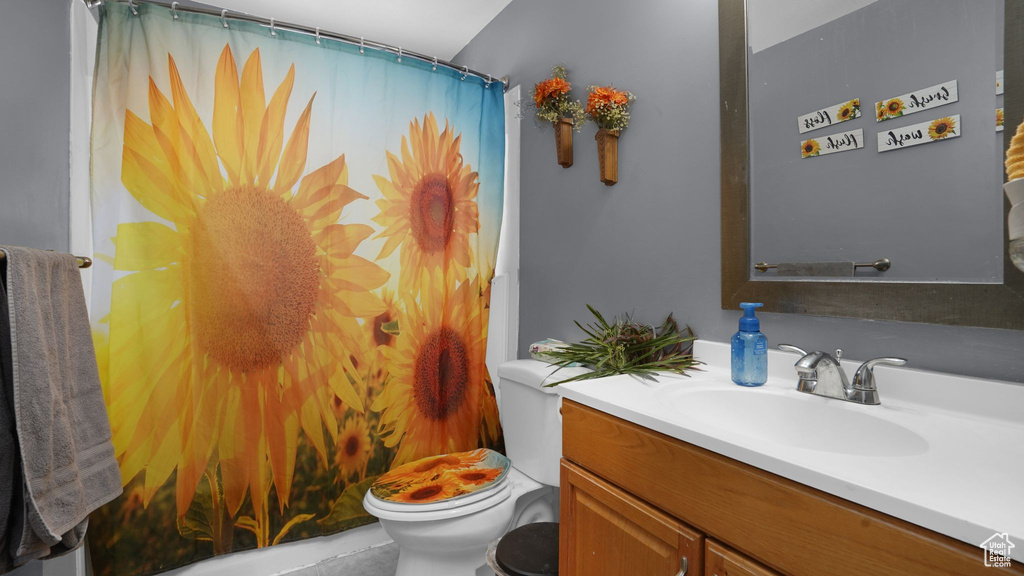 Bathroom featuring toilet and vanity