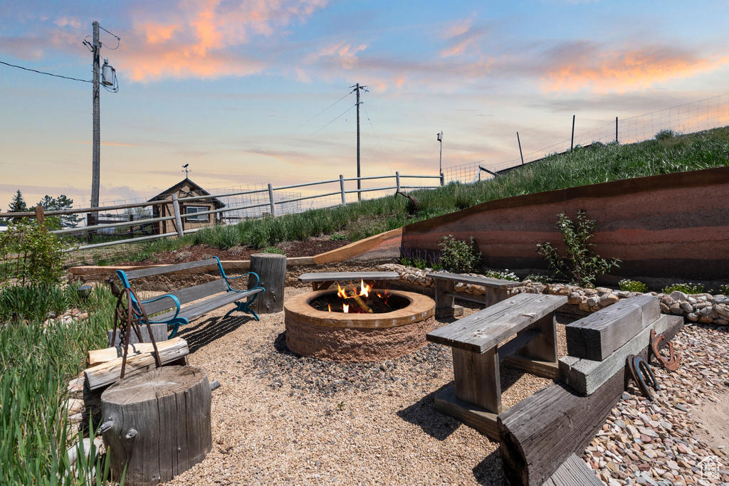 View of patio / terrace with an outdoor fire pit
