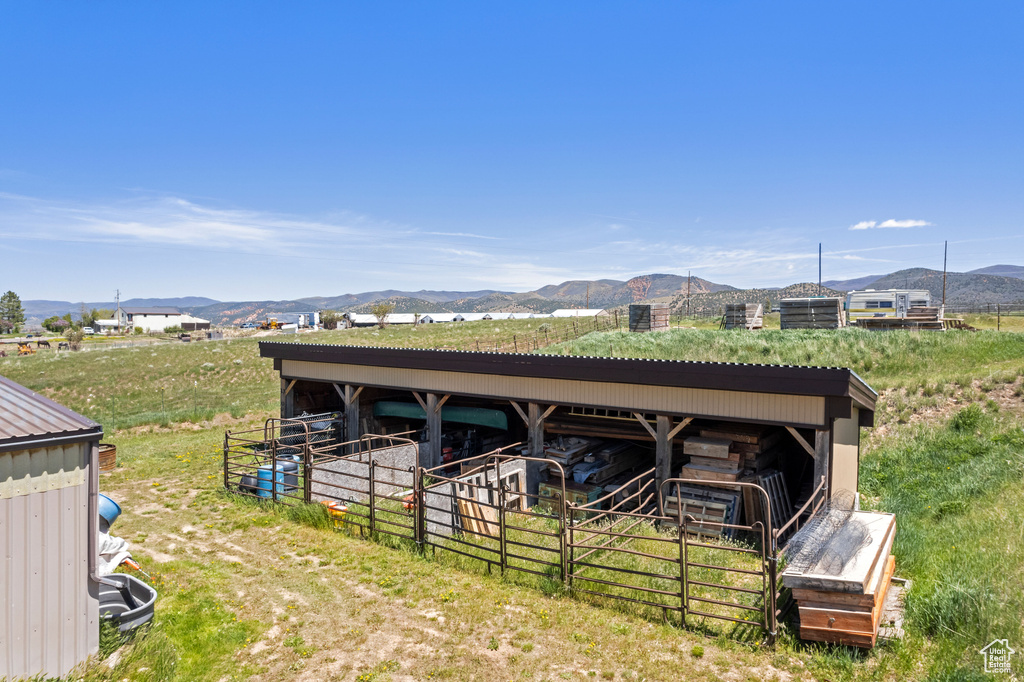 View of outdoor structure with a mountain view and an exterior structure