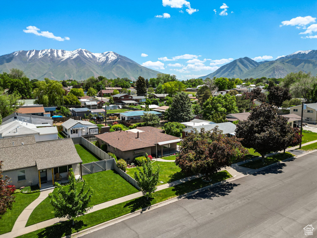 View of mountain backdrop with nearby suburban area