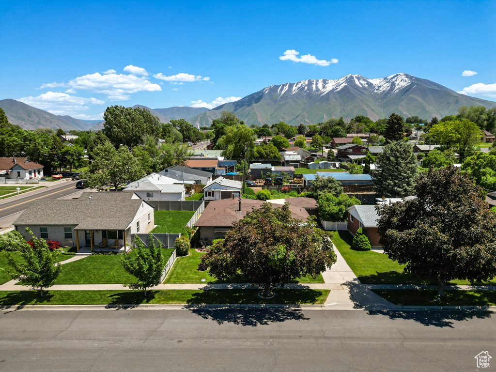 View of mountain background featuring nearby suburban area
