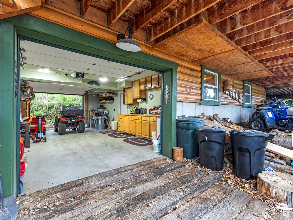 Garage featuring a garage door opener