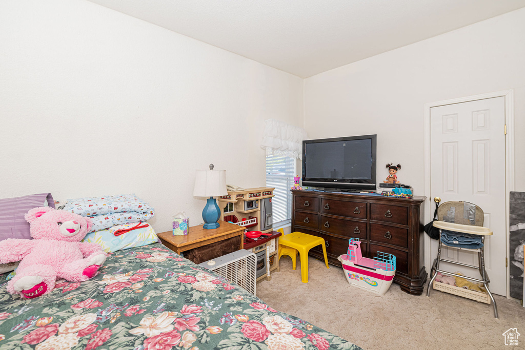 Bedroom with carpet