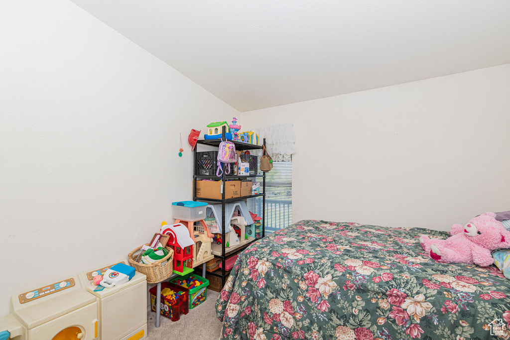 Bedroom with carpet flooring
