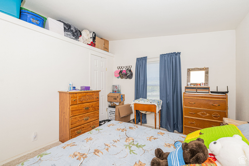 Bedroom featuring baseboards