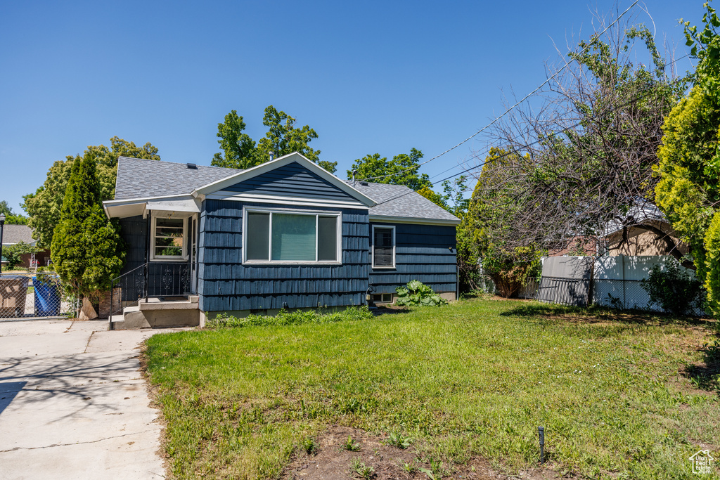 View of front of property featuring roof with shingles